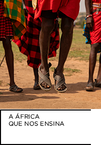 Fotografia. Perna de criança negra pulando. Abaixo, “A ÁFRICA QUE NOS ENSINA”.